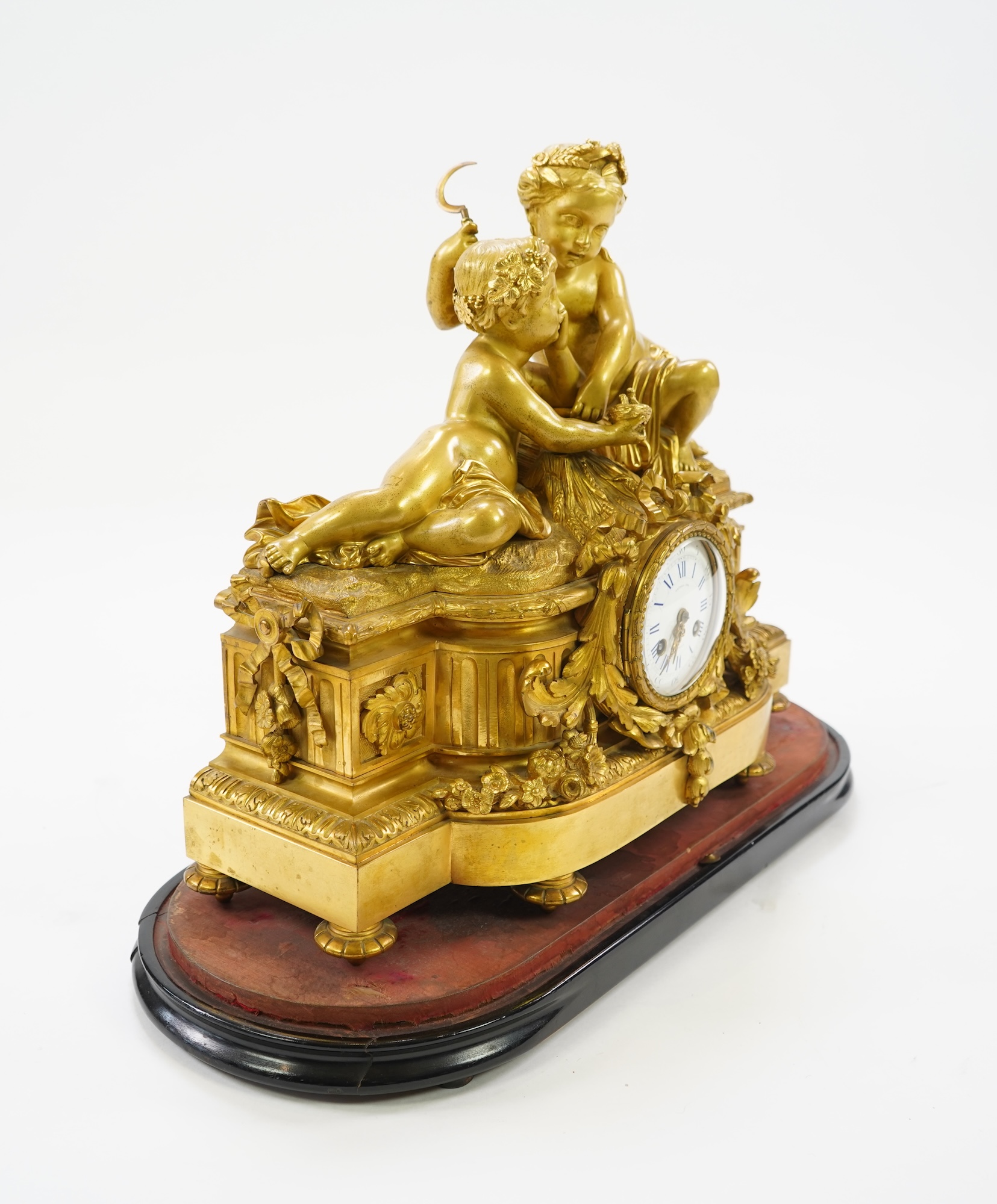 A late 19th century French gilt bronze figural mantel clock